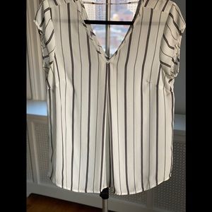 White and black blouse.